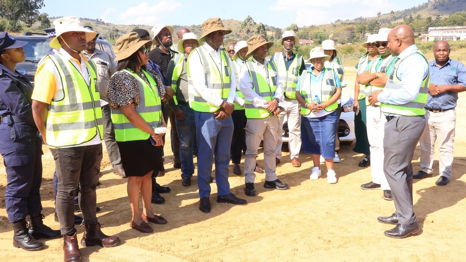 Mankayane CEO David Madlopha explaining a point during the site visit where the stadium will be constructed.